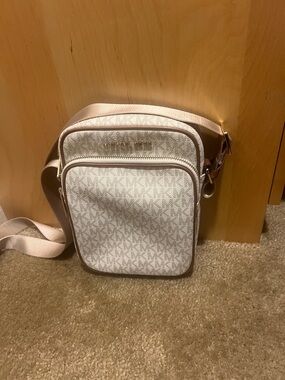 Michael Kors Monogram Crossbody Belt Bag in Light Cream and Beige